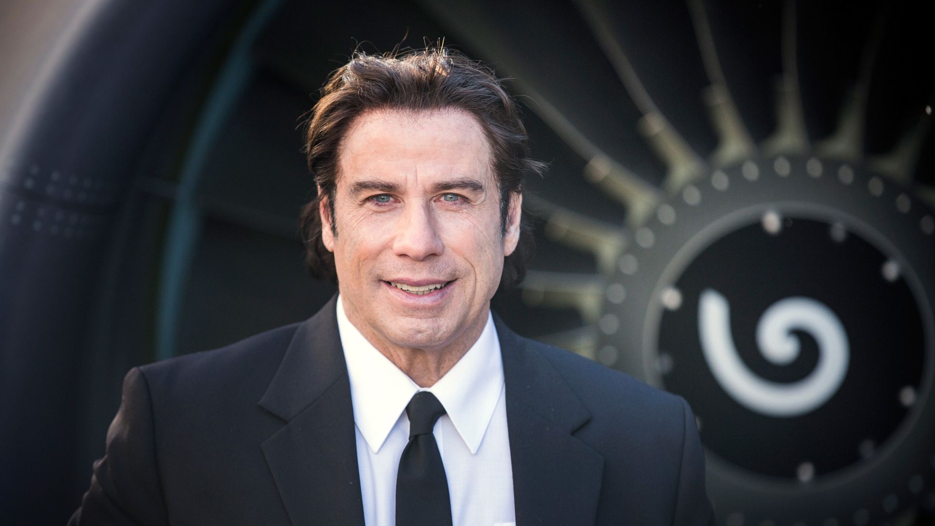 John Travolta według znaku zodiaku Wodnik