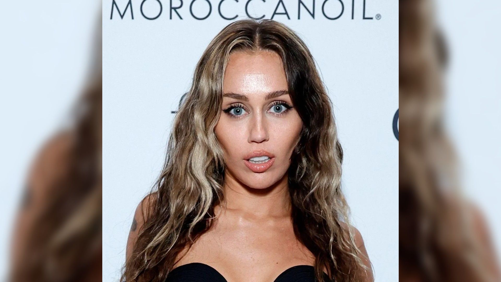 Miley Cyrus, zbliżenie na twarz, długie włosy