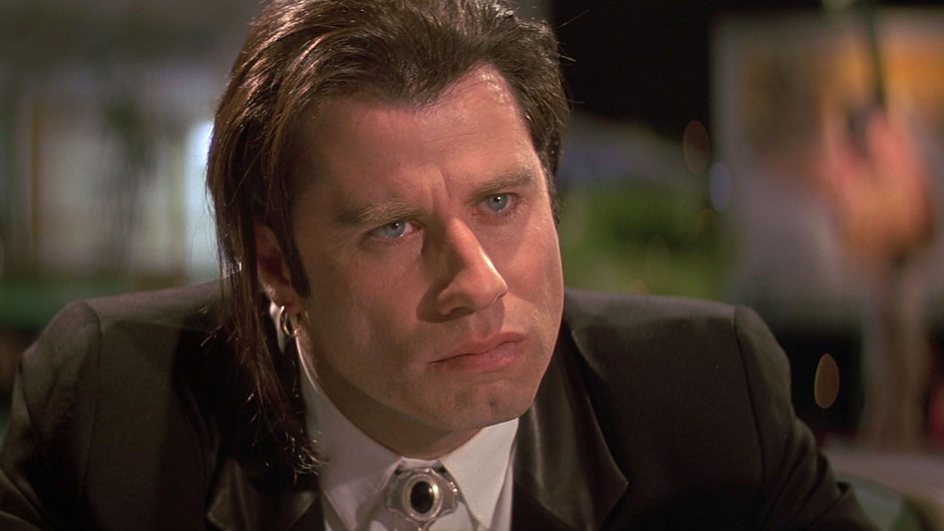 John Travolta jako Vincent Vega w filmie "Pulp Fiction"