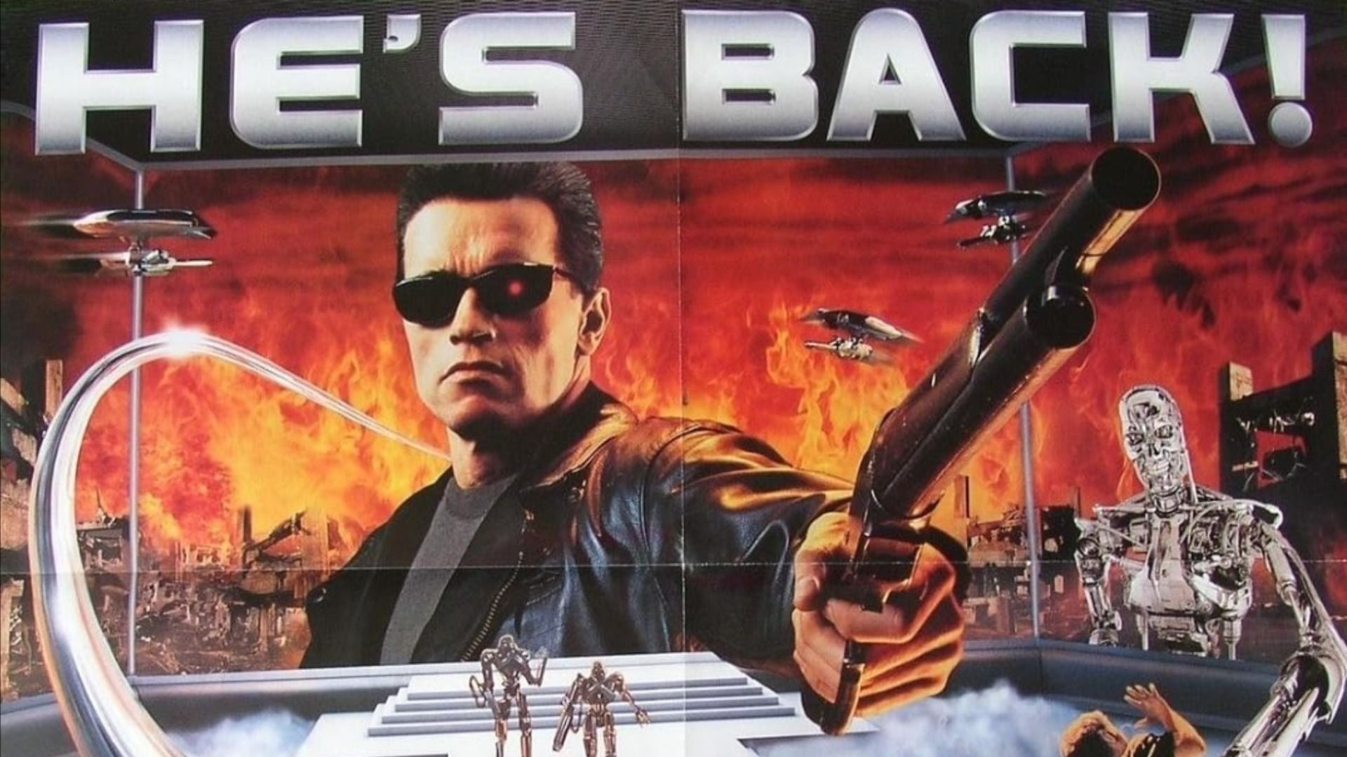 Plakat filmu przedstawiający Arnolda Schwarzeneggera w skórzanej kurtce trzymającego strzelbę